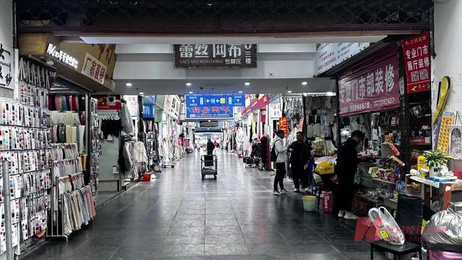气下降商家经营分化 轻纺城：先拢市、再造市尊龙凯时ag旗舰厅网站柯桥纺织交易市场人(图3)